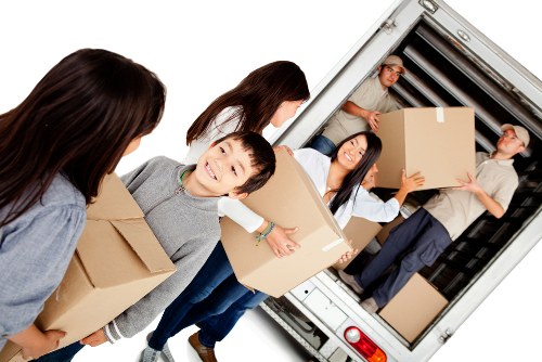 Removals van loading household items in Kingston
