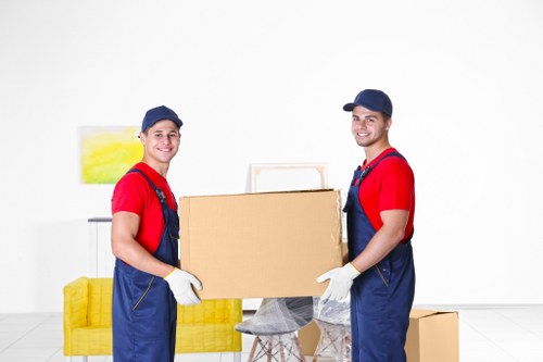 Household items and boxes being transported by a Kingston van service