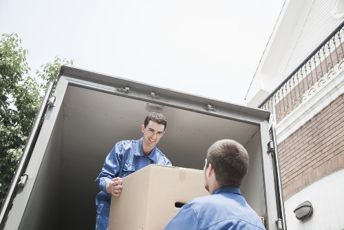 Packed boxes and furniture prepared for a Kingston house move