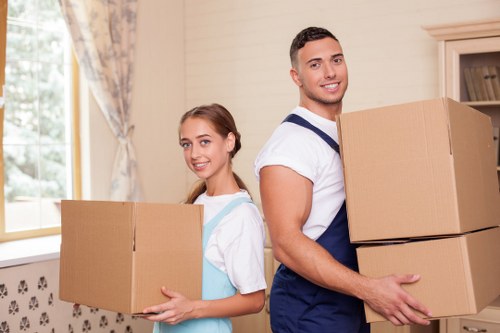 Packed boxes and furniture ready for local removals in Kingston