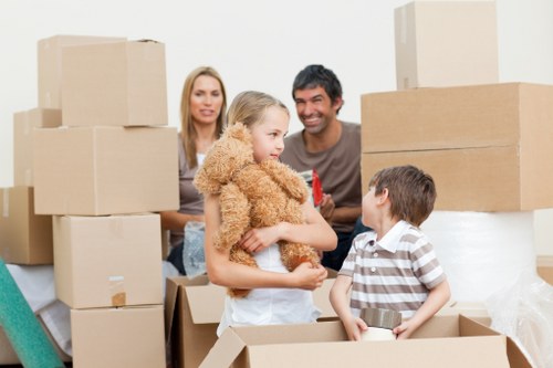 Loading furniture and boxes into a van for a Kingston move